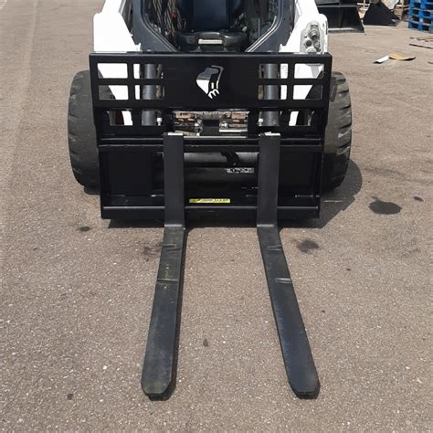 fork exteneders for skid steer|universal skid steer forks.